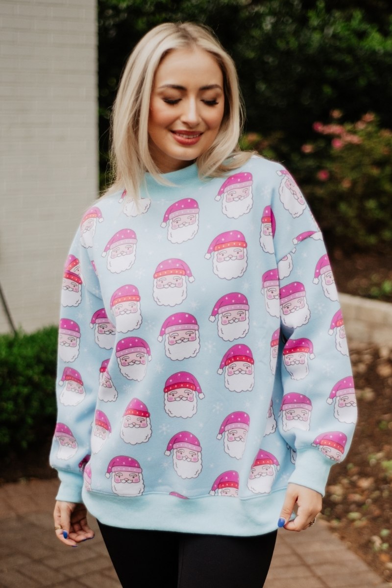 Pink Santa Faces All Over Sweatshirt