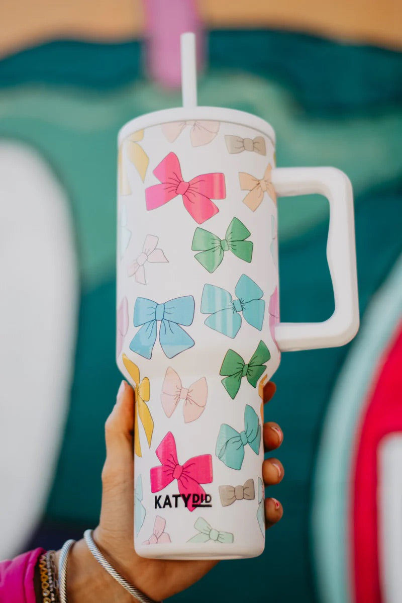 A bow-print multi-colored tumbler