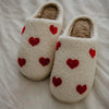 repeat red fuzzy heart slippers