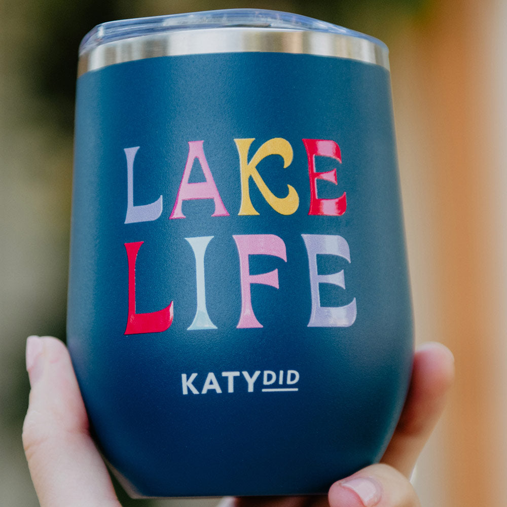 https://www.katydidwholesale.com/cdn/shop/products/lake-life-tainless-steel-wine-tumbler-with-lid-navy-for-women_2048x.jpg?v=1699999061